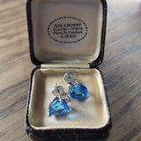 Shimmering Heart Shaped Blue Topaz & Diamond Earrings in 14K White Gold